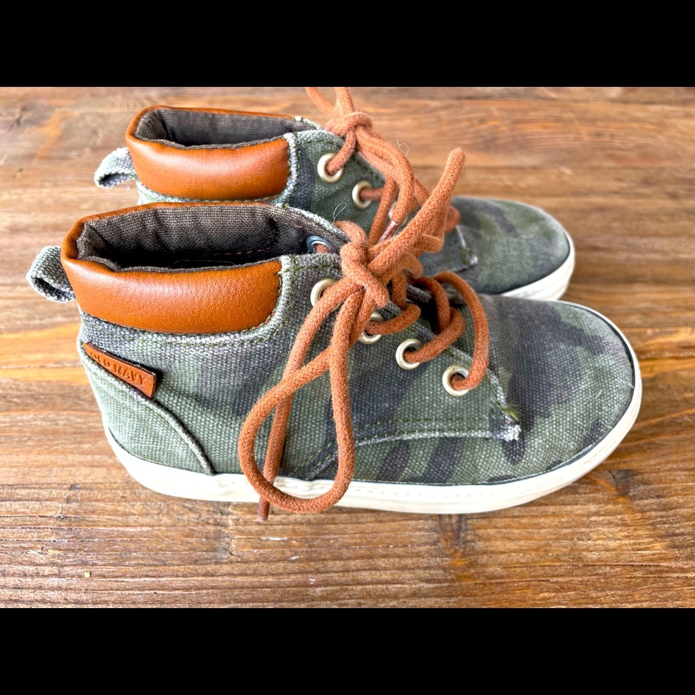 Camo lace high top shoes.
